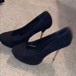 Black and gold high heels